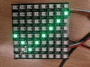 LED array displaying green tick